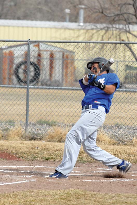 Carlos Maldonado, a Moffat County High School senior, follows through with his swing Tuesday against Union High School at Craig Middle School.