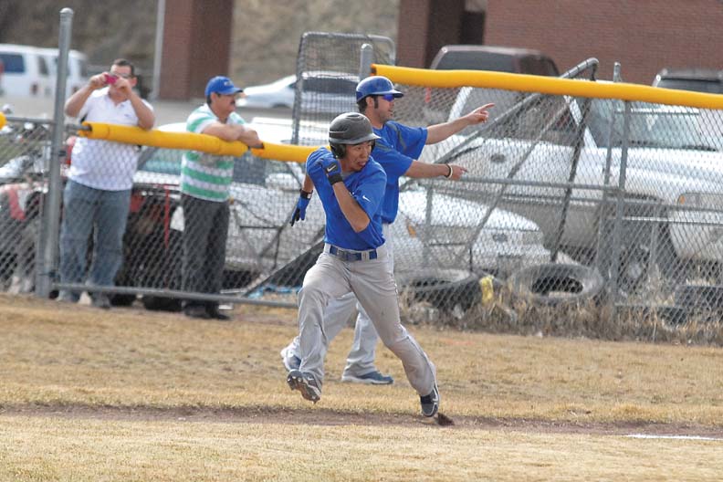 Jacob Teeter, a Moffat County High School junior, heads for home Tuesday against Union High School at Craig Middle School.