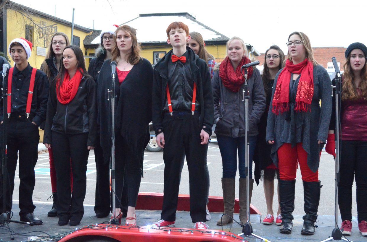 Members of Moffat County High School's Good Vibes A Capella sing during Down Home Christmas Celebration Saturday at Alice Pleasant Park. The MCHS choir will host a concert at 7 p.m. Tuesday.