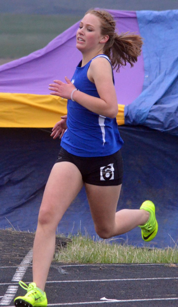 Moffat County High School's Rachel Witt rounds a corner as she runs the 400-meter dash in Friday's Clint Wells Invitational at MCHS.