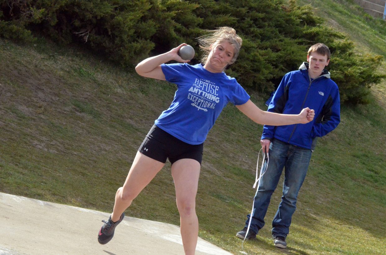Moffat County High School's Morgan Nelson puts all her strength into the shot put during Friday's Clint Wells Invitational at MCHS.