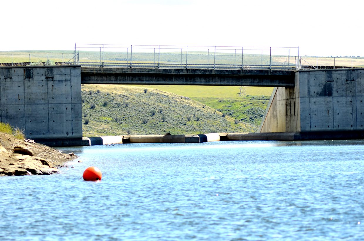 Officials are looking at putting a screen on the spillway at Elkhead Reservoir to prevent the northern pike and small-mouth bass from escaping into the Yampa River and killing the native fish.