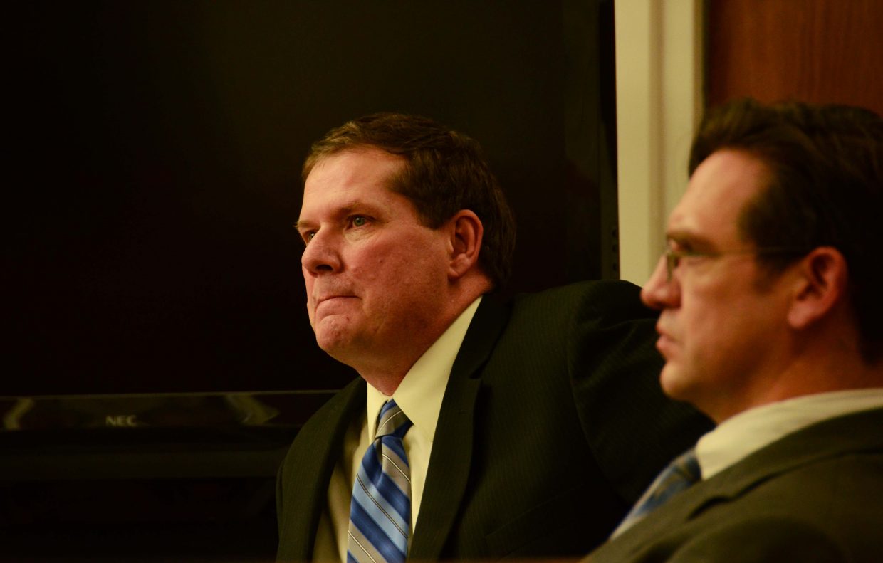 Fief, background, is on trial for the murder of Shane Arredondo on Dec. 9, 2012. Fief's lawyer, Jeremy Snow, foreground, has been arguing that Fief acted out of recklessness and heat-of-the-moment aggression and not with the intent to kill.