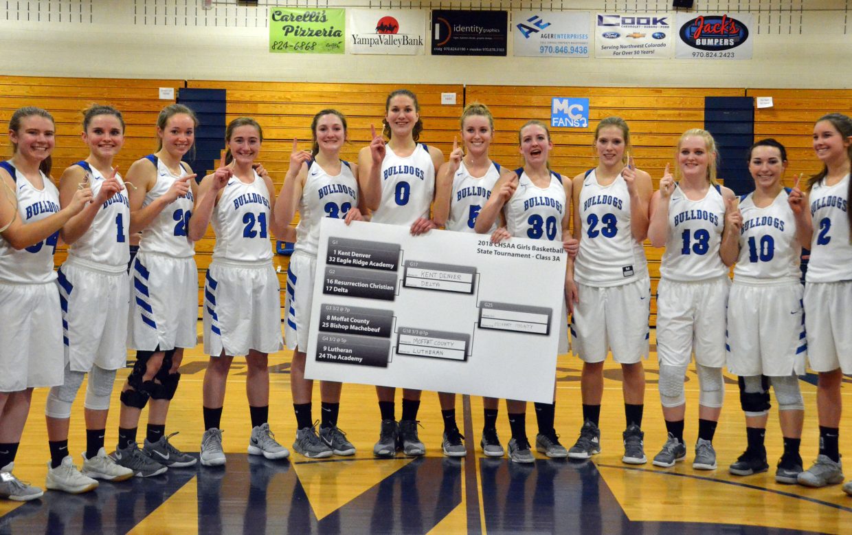 Moffat County High School varsity players proudly display the regional brackets of the 3A CHSAA State Championships. Eighth-seeded MCHS will face No. 1 Kent Denver in the Great 8.