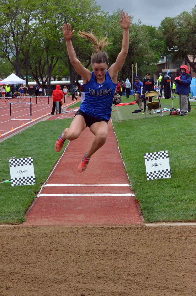 Moffat County High School's Stephenie Swindler takes her final leap in the long jump Saturday at the CHSAA State Championships.