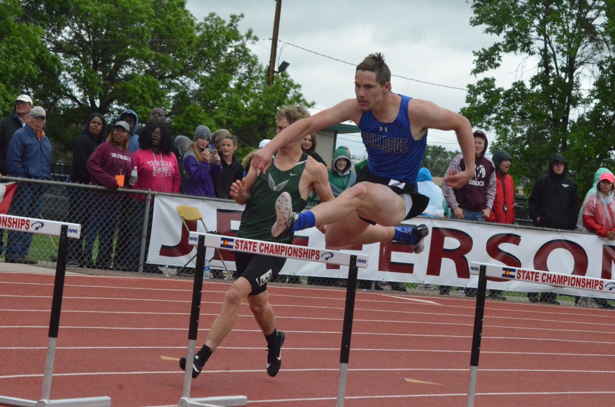 Moffat County High School's Miki Klimper heads into the final turn of the 300-meter hurdles Saturday at the CHSAA State Championships.
