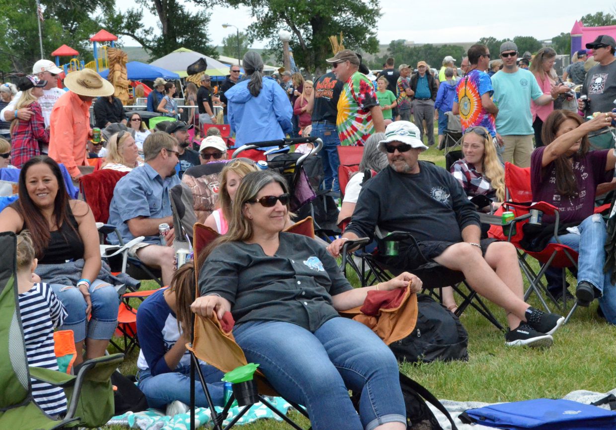 Spectators stake out their seats to await the final concert at the 19th annual Whittle the Wood Rendezvous.