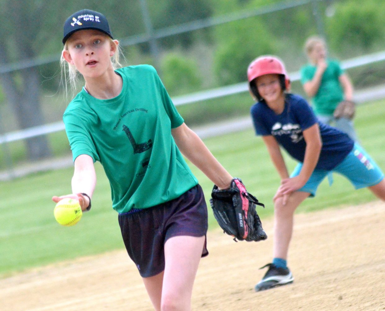 Emma Tucker lets loose a pitch during a Tuesday game between Western American Drilling and Craig Family Dental.