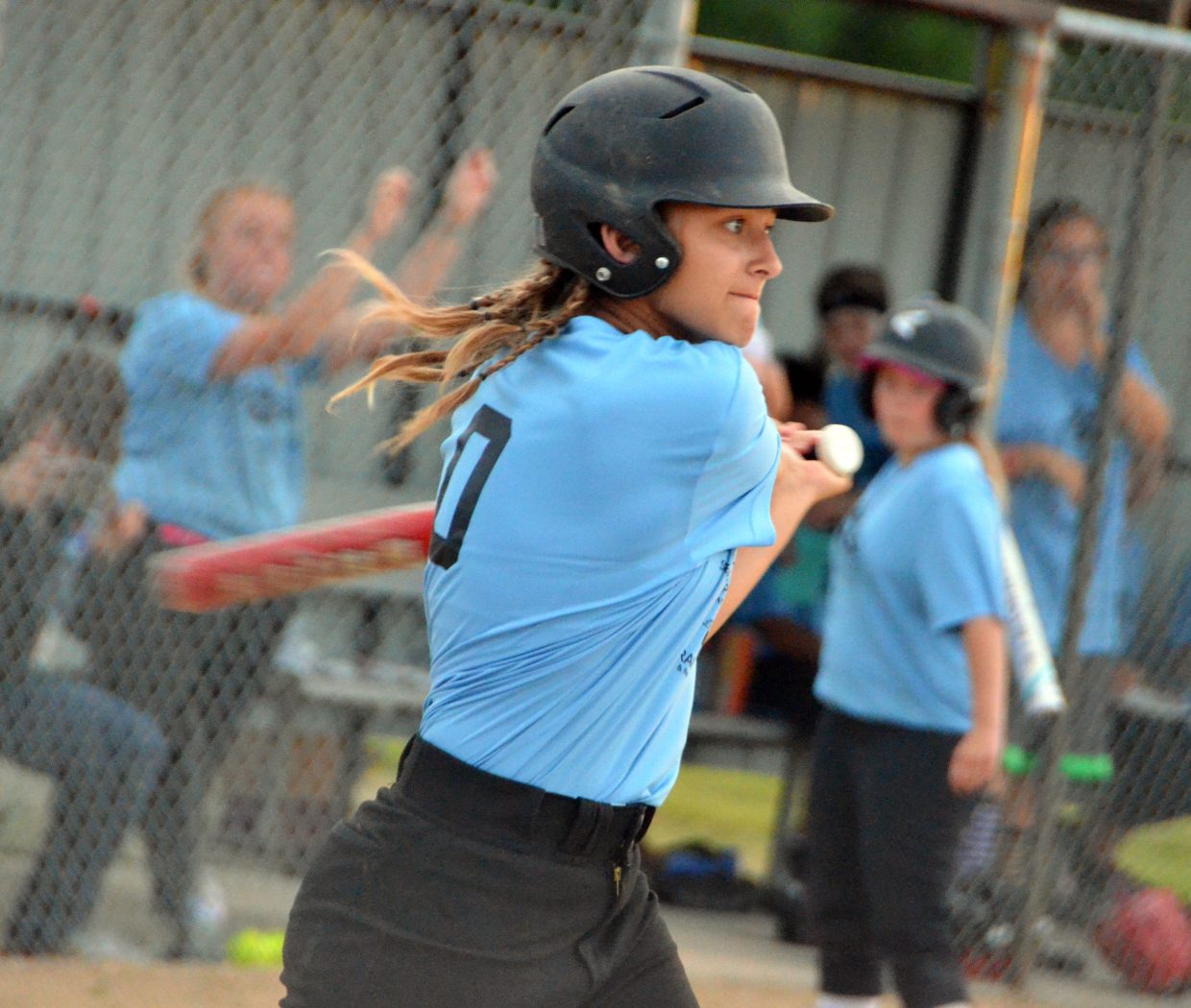 Makaylah Hampton watches a hard hit go into the outfield before heading to first base.