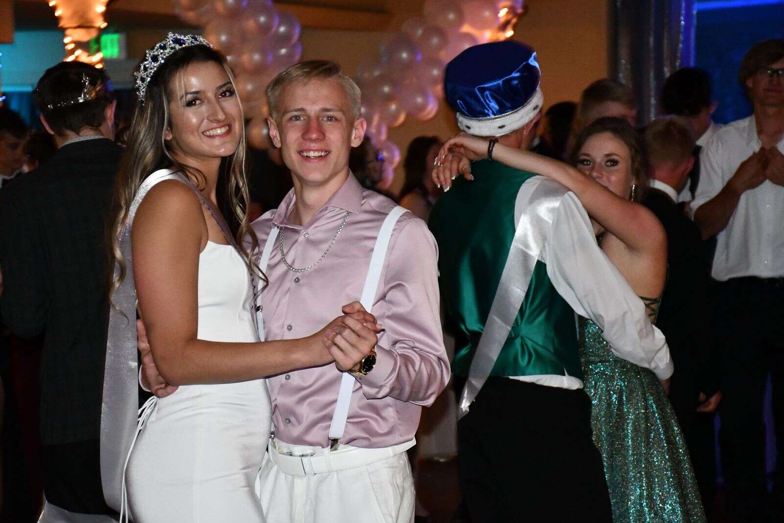 Hannah Vazquez shares a dance with Chris Maneotis at Prom Saturday. (Andy Bockelman / For Craig Press)