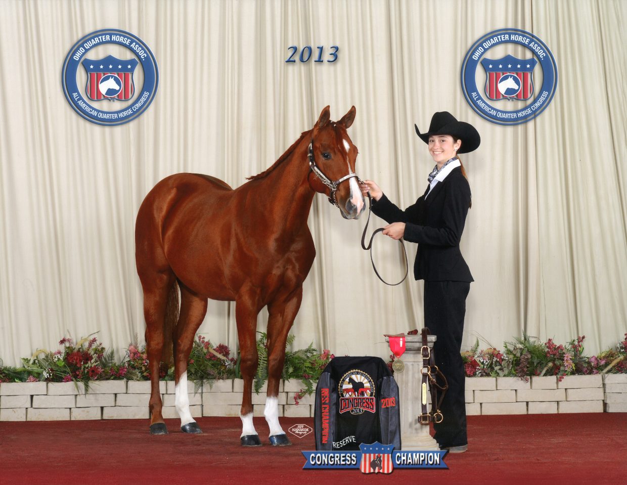 The Suttons donated this mare — RWS Color Me Intrigued — to the Ranching Heritage Young Horse Development Program. She was Reserve Youth Yearling Mare at the 2013 Quarter Horse Congress.