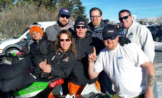 Leadville adaptive snocross racer Billy Burkhardt (center) at the 2016 X Game Aspen with his race crew, a collection of friends and family including his ex-wife, pro snowmobile racer Oksana Burkhardt (second from right).