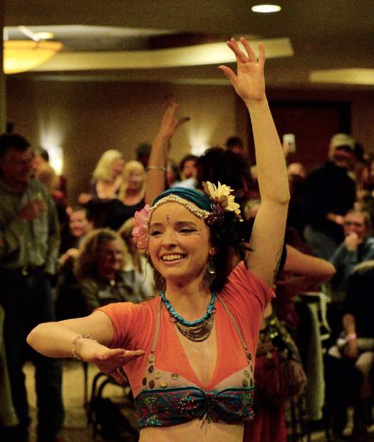 Alia Dye of the EveryBelly Dancers performs Friday night during the 28th Tim McClure Benefit at the DoubleTree in Breckenridge.