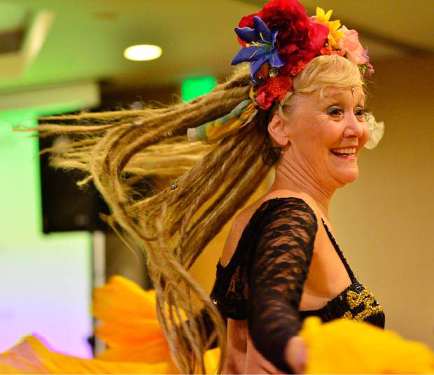 Pam Seegers of the EveryBelly Dancers performs Friday night during the 28th Tim McClure Benefit at the DoubleTree in Breckenridge.