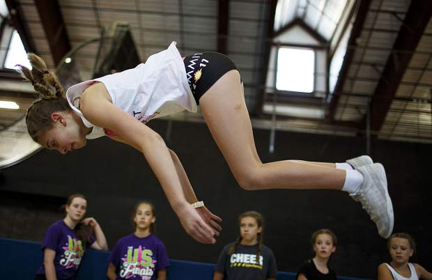 Woodward cheerleading campers run a few practice drills ahead of a full-session Wednesday, June 28, at Copper Mountain.