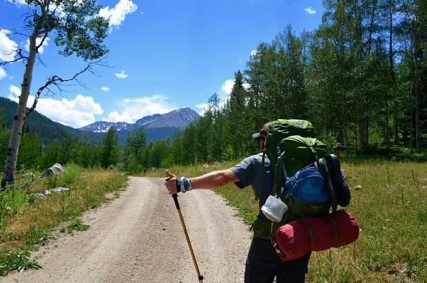 After hours of bushwhacking and stepping over logs, morale on the trail hit a low point when we contemplated thumbing a ride back to our car from the private road that passed by Black Lake Reservoir.