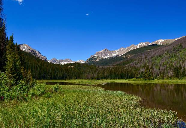 Stunning mountain views from the shores of Boulder Lake, an easy offshoot from the Gore Range Trail.