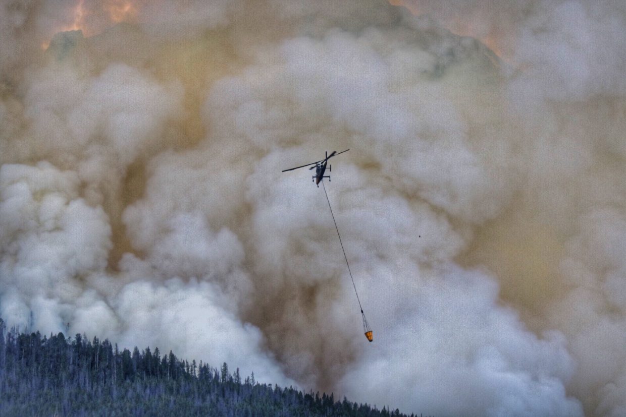 A wildfire near Breckenridge is now burning roughly 70 acres and appears to be growing fast.