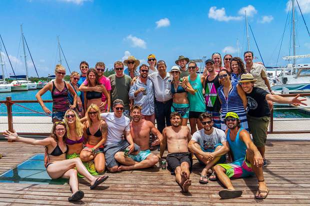 A large group of Americans, many of which hail Summit County and Vail, helped set a new mark for sailing the route from Cienfuegos, Cuba, to the islands of Cayo Guano and Cayo Largo del Sur. Here, they all pose with a local harbor master at center.