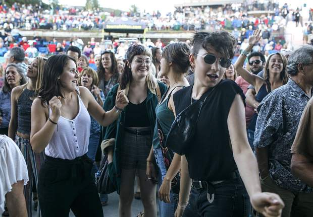 Fans dance in tune with The Nacho Men band during the Dillon Concert Series Friday evening, June 29, at the Dillon Amphitheater.