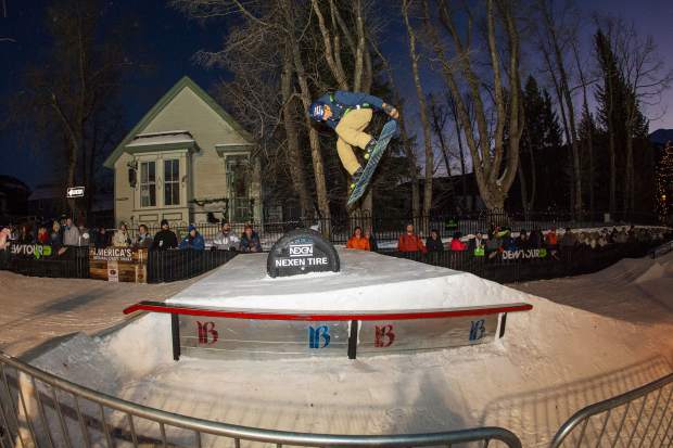 Snowboarder Ozzy Henning executes a trick during last year's Dew Tour Streetstyle event, which takes place annually on a man-made rail jam type course on Washington Avenue in downtown Breckenridge.