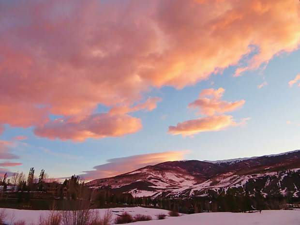 Low horizon sun highlighting the clouds seen from Silverthorne.
