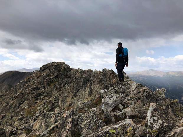 Michal Ovsjannikov works his way down the Tenmile Traverse. The experienced ridge runner and endurance athlete fell about 60 feet down the mountainside after summiting Peak 2 along the Tenmile Traverse last summer.