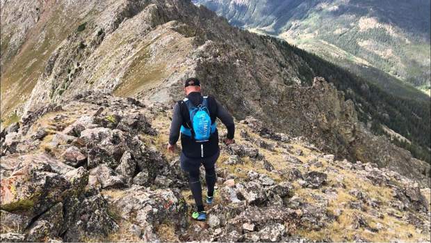 Michal Ovsjannikov works his way down the Tenmile Traverse. The experienced ridge runner and endurance athlete fell about 60 feet down the mountainside after summiting Peak 2 along the Tenmile Traverse last summer.