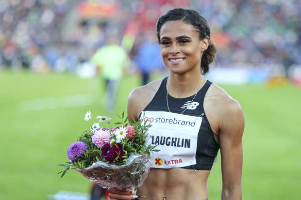 FILE - In this June 13, 2019, file photo, Sydney McLaughlin of the United States poses after winning women's 400m hurdles event at the IAAF Diamond League athletics competition in Oslo, Norway. About to turn 20 next month, she's juggling quite a few things these days _ new coach, living on the West Coast, making the transition from college to the pro circuit and the weight of lofty expectations. Her name constantly surfaces among the ones to watch heading into the Tokyo Games next summer.(Lise Aserud/NTB Scanpix via AP, File)