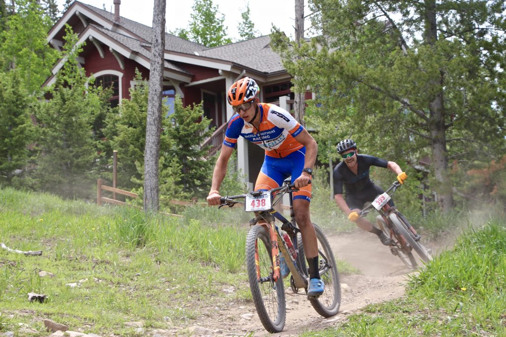 A member of the Konecny-Yackle men's duo team rides during Thursday's Firecracker 50 mountain bike race in Breckenridge.