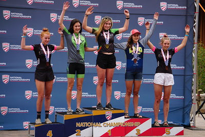 Elsa Bates of Breckenridge (center) celebrates on the podium after winning a preliminary race during last month's USA Cycling Mountain Bike National Championships in Winter Park.