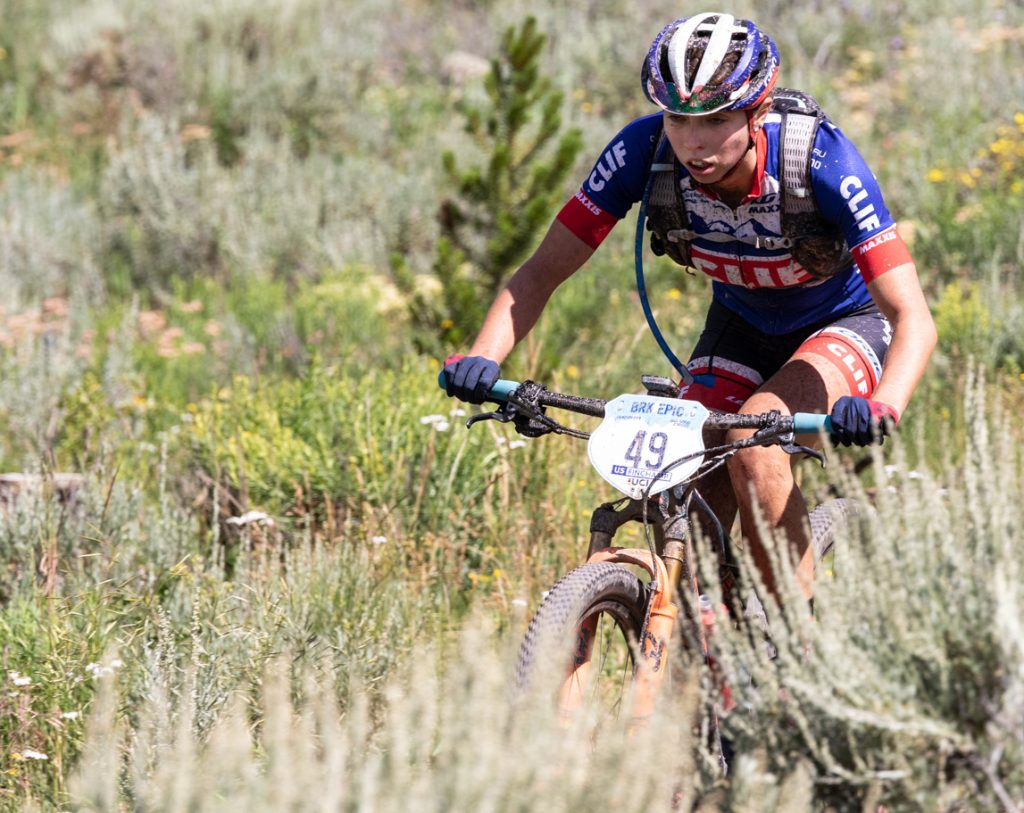 Hannah Finchamp cycles over some roots during Monday morning's second stage of the Breck Epic week-long mountain bike race. Finchamp took second place in the first two stages of this year's race.