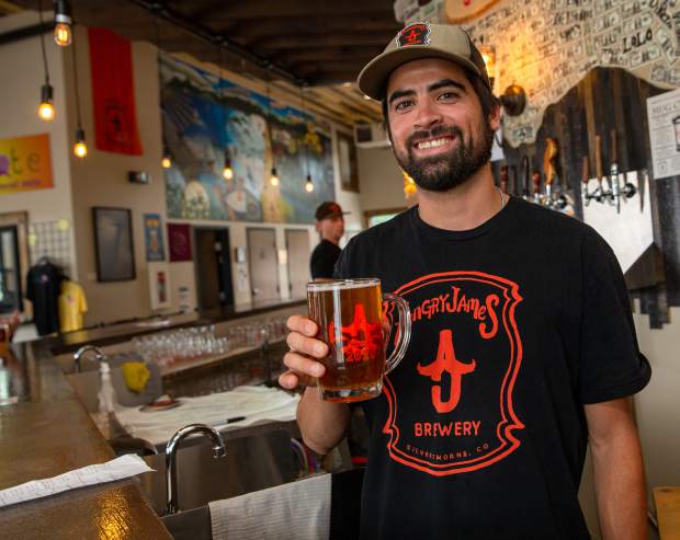 Chaz serves up an Alpen Weisse at Angry James Brewery in Silverthorne.