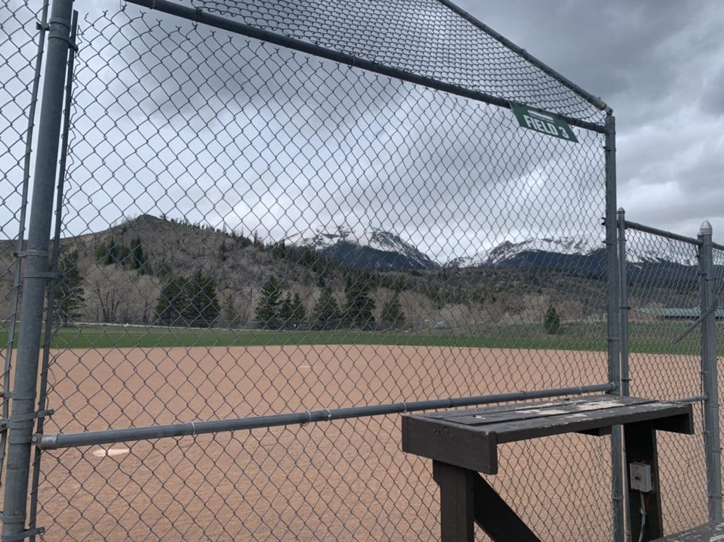 Summit softball league resumes after county halts play