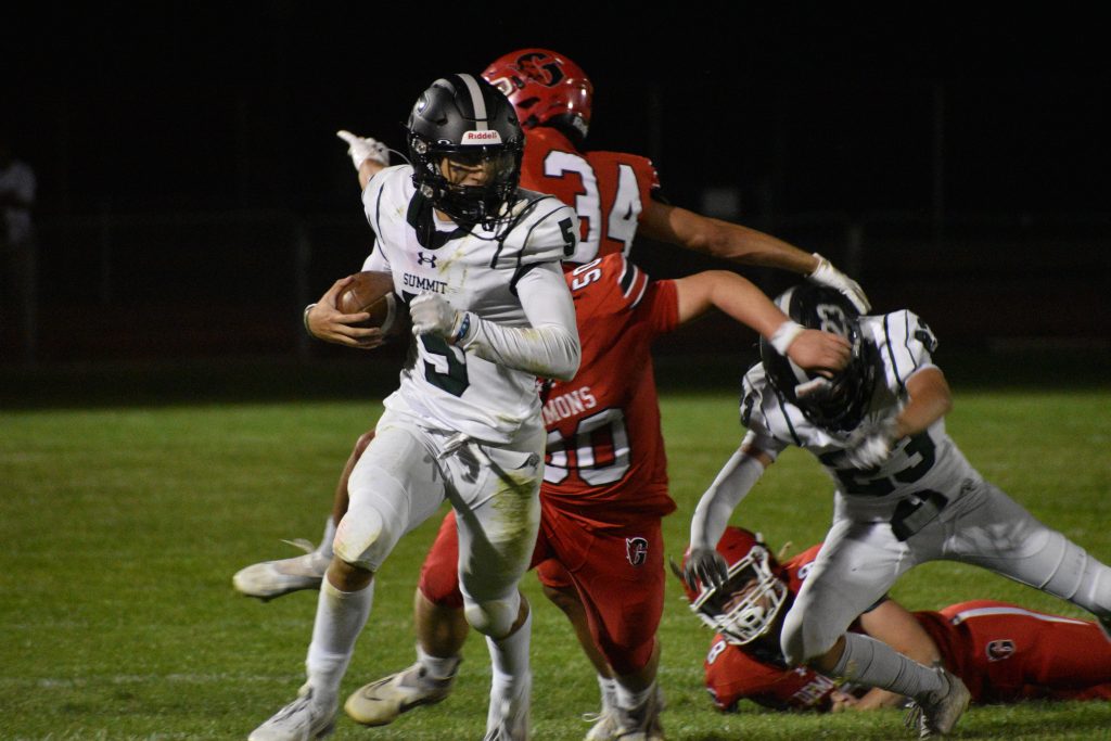 Summit high school football team hangs tough against glenwood springs