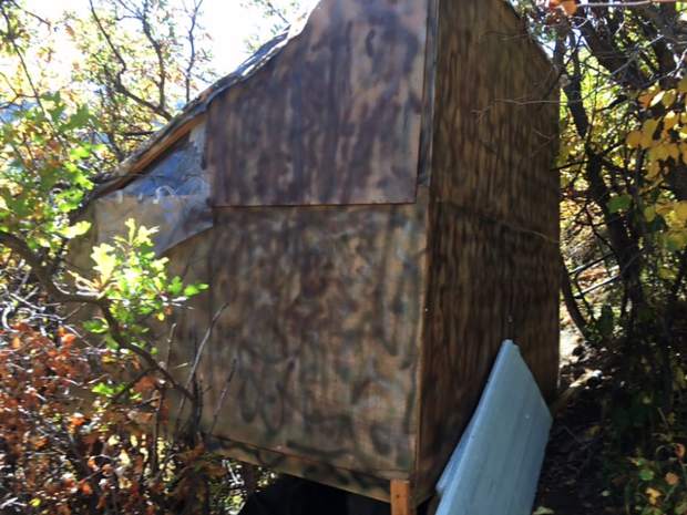 A shack built on Aspen Mountain above the Shadow Mountain Condominiums featured insulation, a locking front door, a foundation and a window.