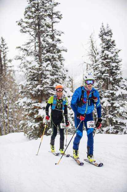 Eric Kenney and Jonah Adley skinning up Aspen Mountian during the Power of Four on Saturday.