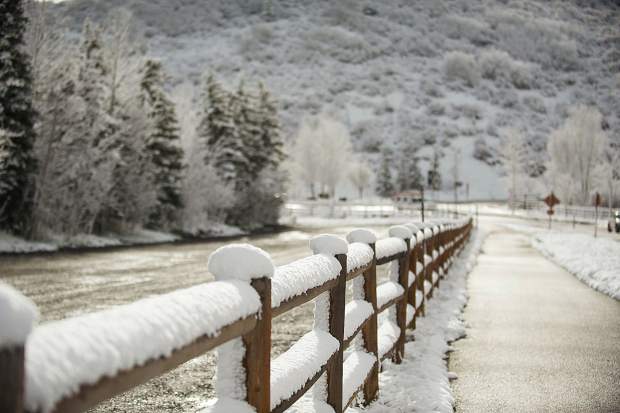 Fence posts were lined with fresh snow this morning in Snowmass.