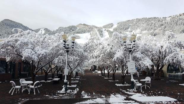 If only for a few hours, the browns spots on Ajax Mountain again were covered Tuesday after the overnight snow in Aspen. The resort closed for the season Sunday.
