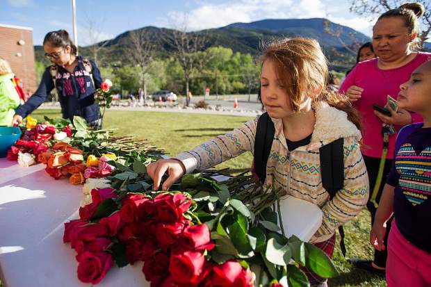 Mikayla Stuhaug, 7, purchases flowers for her teacher at Basalt Elementary for Teacher Appreciation Week at Basalt Elementary on Wednesday.