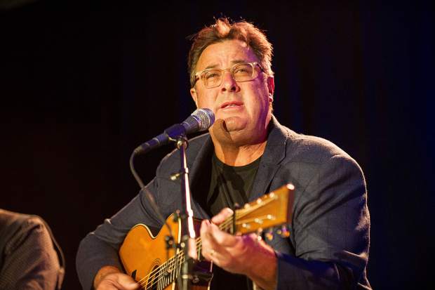 Vince Gill performing at the Challenge Aspen benefit known as the Vince Gill and Amy Grant 14th Anniversary Gala and Golf Classic at the St. Regis Monday evening.