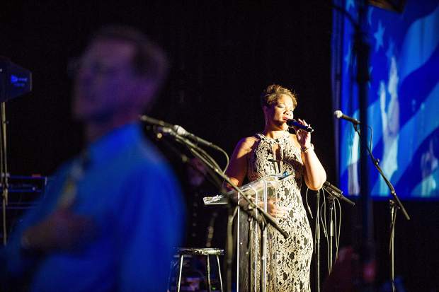 Veteran Zaneta Adams singing the National Anthem at the Vince Gill and Amy Grant 14th Anniversary Gala and Golf Classic at the St. Regis Monday evening.