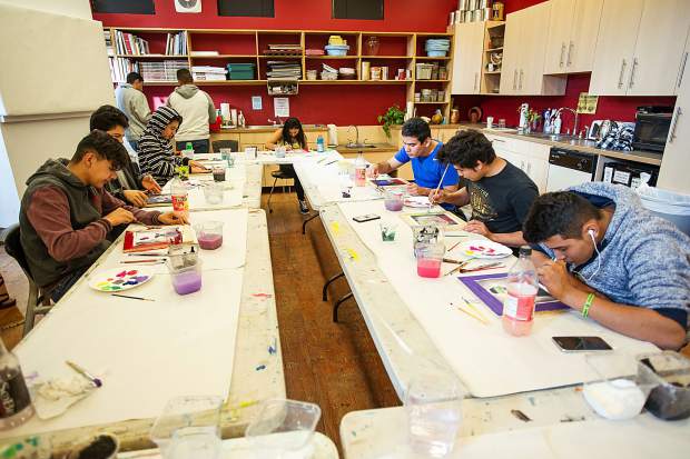 Students working on their self portraits for the mural on November 2 at the Basalt Art Base.