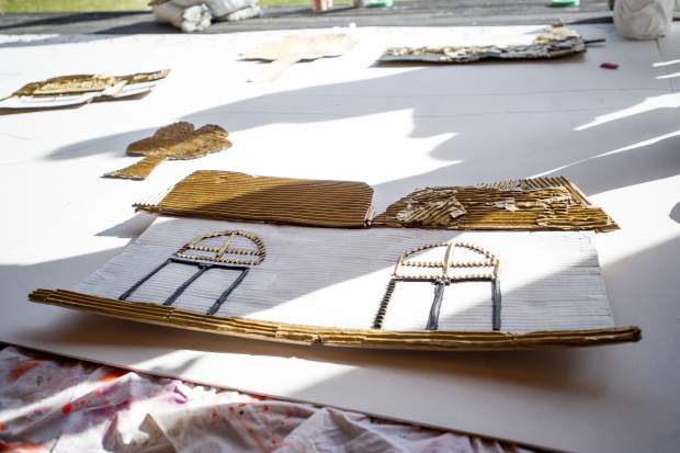 A house for the mural at the Basalt Art Base created by the dreamers.