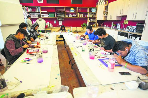 Students working on their self portraits for the mural on November 2 at the Basalt Art Base.