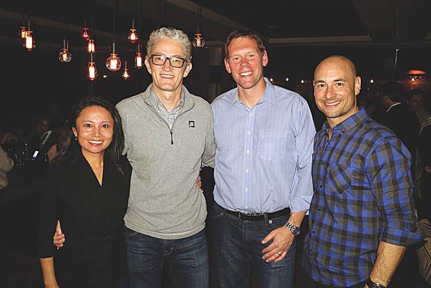 Alice Hill with Alan Hill, CEO of JonesTrading, and Justin Clemow and Brian Cavalier.