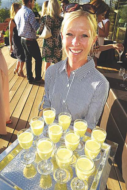 Christine Rueggeberg serving mango mint lassi shooters.