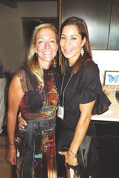 Alexa Wesner, who graciously welcomed guests to her home for the event, alongside friend Frederica Middleton.