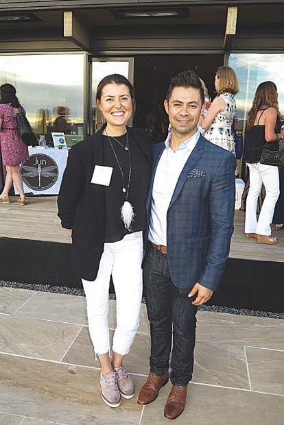 Brittanie Rockhill and Ivan Estrada with Douglas Elliman Real Estate.