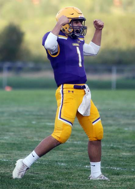 Basalt senior Trevor Reuss celebrates after the team forced an early fumble against Olathe in a home game earlier this season.